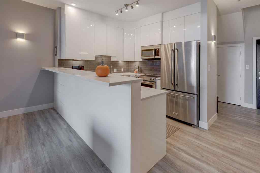 MLS&reg; # A2269203 - Unit #403 1441 23 Avenue SW in Bankview Calgary, Residential Open Houses