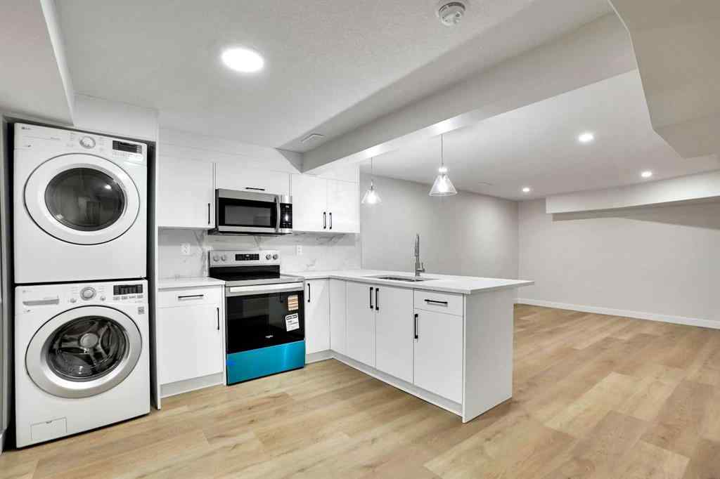 MLS® A2269209 - 903B Queensland Drive SE in Queensland Calgary, Residential