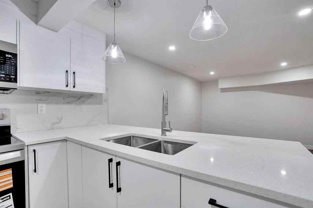 MLS® A2269209 - 903B Queensland Drive SE in Queensland Calgary, Residential