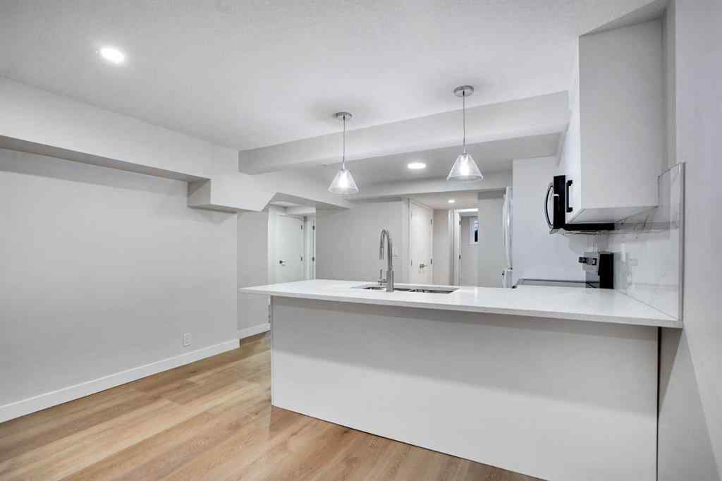 MLS® A2269209 - 903B Queensland Drive SE in Queensland Calgary, Residential