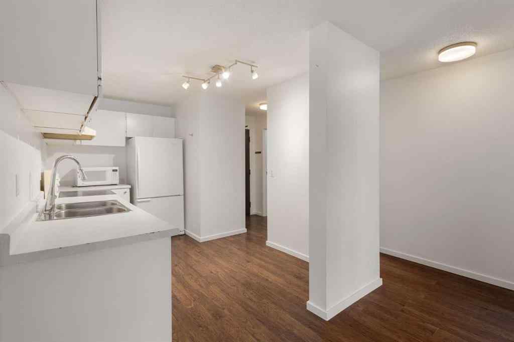 MLS&reg; # A2269215 - Unit #205 630 57 Avenue SW in Windsor Park Calgary, Residential Open Houses