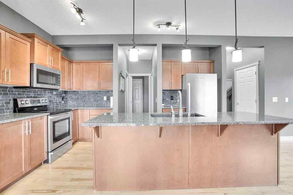 MLS® A2269299 - 208 Sagewood Landing SW in Sagewood Airdrie, Residential