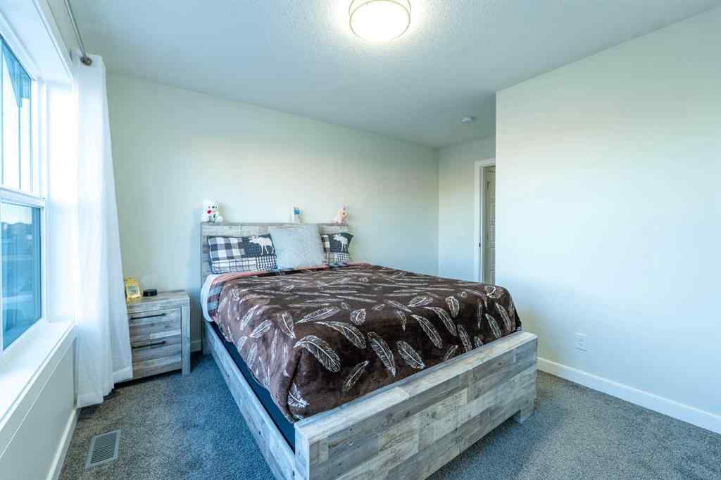 MLS® A2269302 - 15 Midgrove Drive SW in Midtown Airdrie, Residential