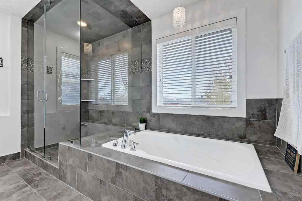 MLS&reg; # A2269307 - 63 Ravenscroft Close SE in Ravenswood Airdrie, Residential Open Houses