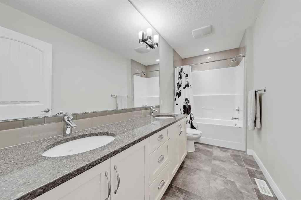 MLS&reg; # A2269307 - 63 Ravenscroft Close SE in Ravenswood Airdrie, Residential Open Houses