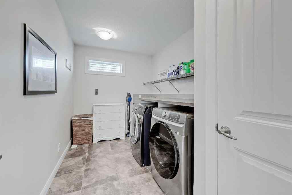 MLS&reg; # A2269307 - 63 Ravenscroft Close SE in Ravenswood Airdrie, Residential Open Houses