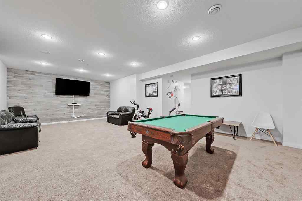 MLS&reg; # A2269307 - 63 Ravenscroft Close SE in Ravenswood Airdrie, Residential Open Houses