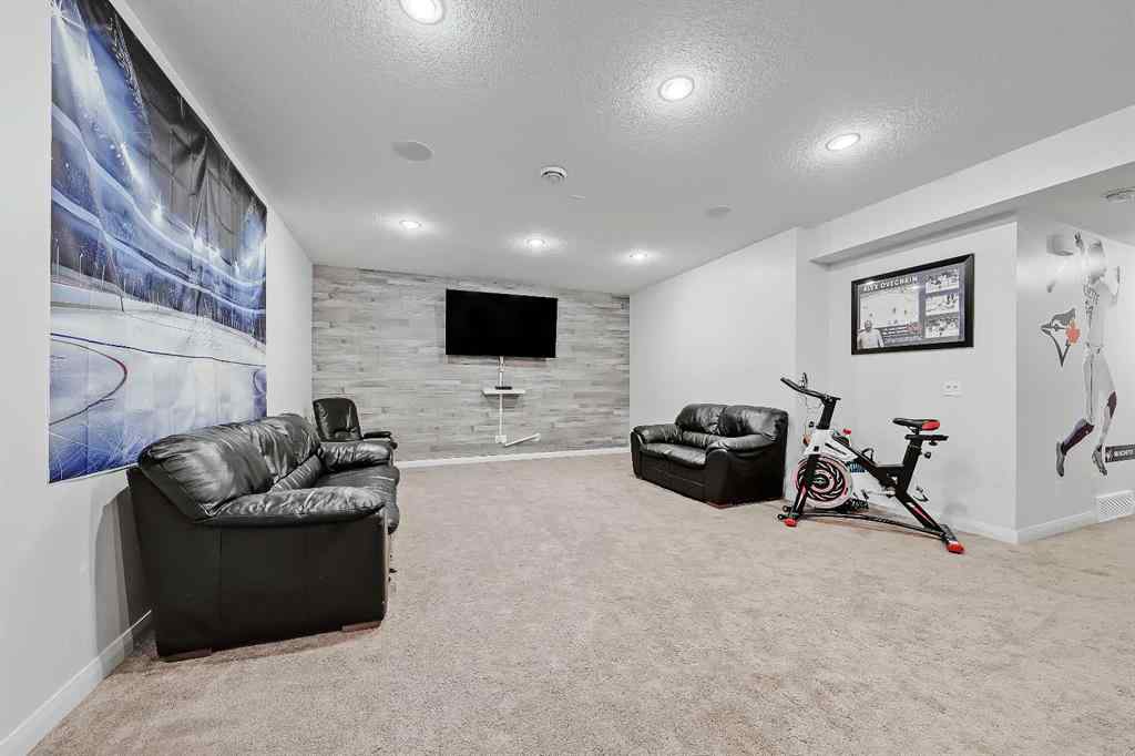 MLS&reg; # A2269307 - 63 Ravenscroft Close SE in Ravenswood Airdrie, Residential Open Houses