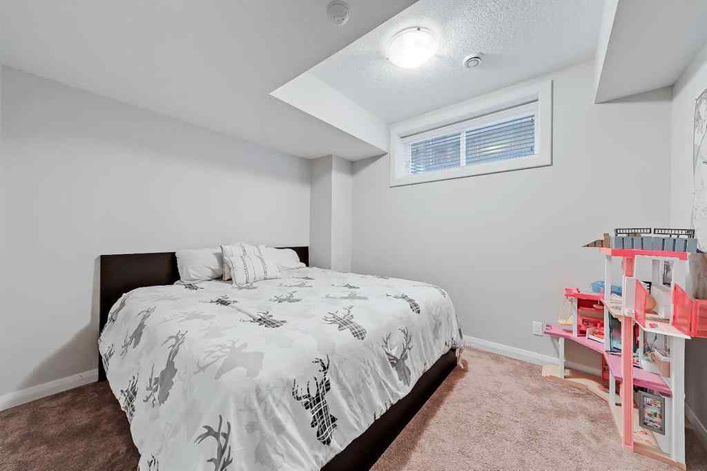 MLS&reg; # A2269307 - 63 Ravenscroft Close SE in Ravenswood Airdrie, Residential Open Houses