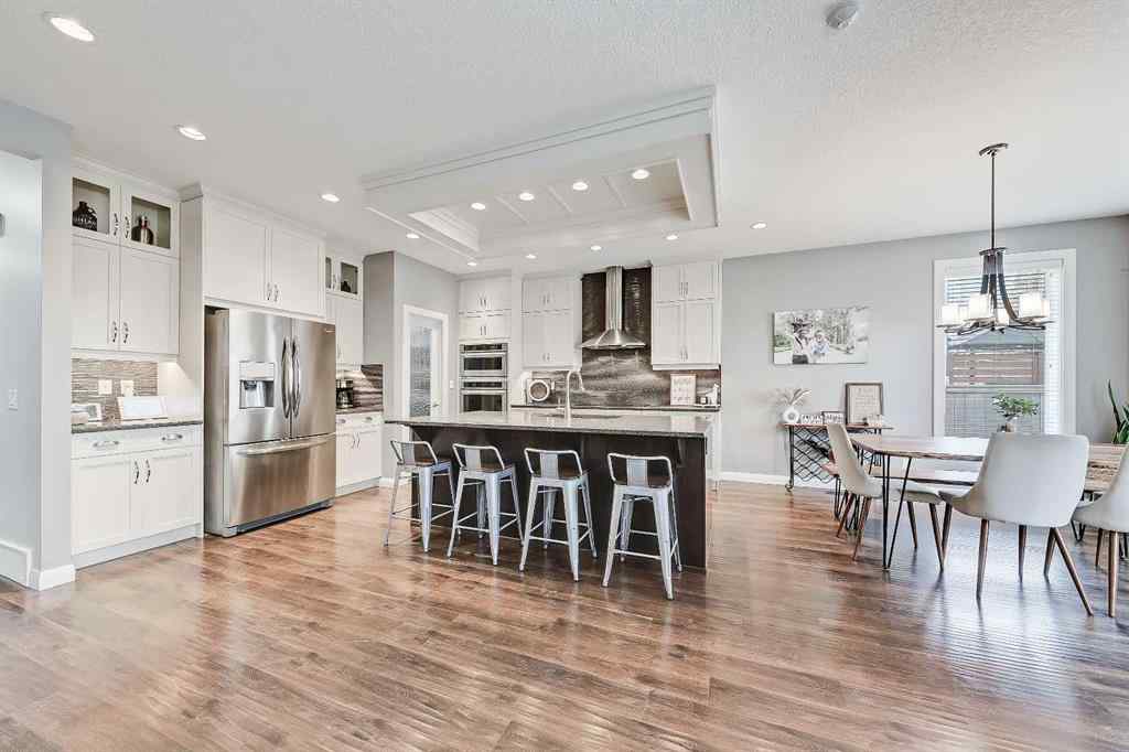 MLS&reg; # A2269307 - 63 Ravenscroft Close SE in Ravenswood Airdrie, Residential Open Houses