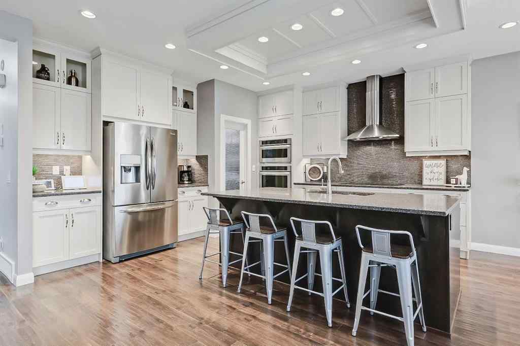 MLS&reg; # A2269307 - 63 Ravenscroft Close SE in Ravenswood Airdrie, Residential Open Houses