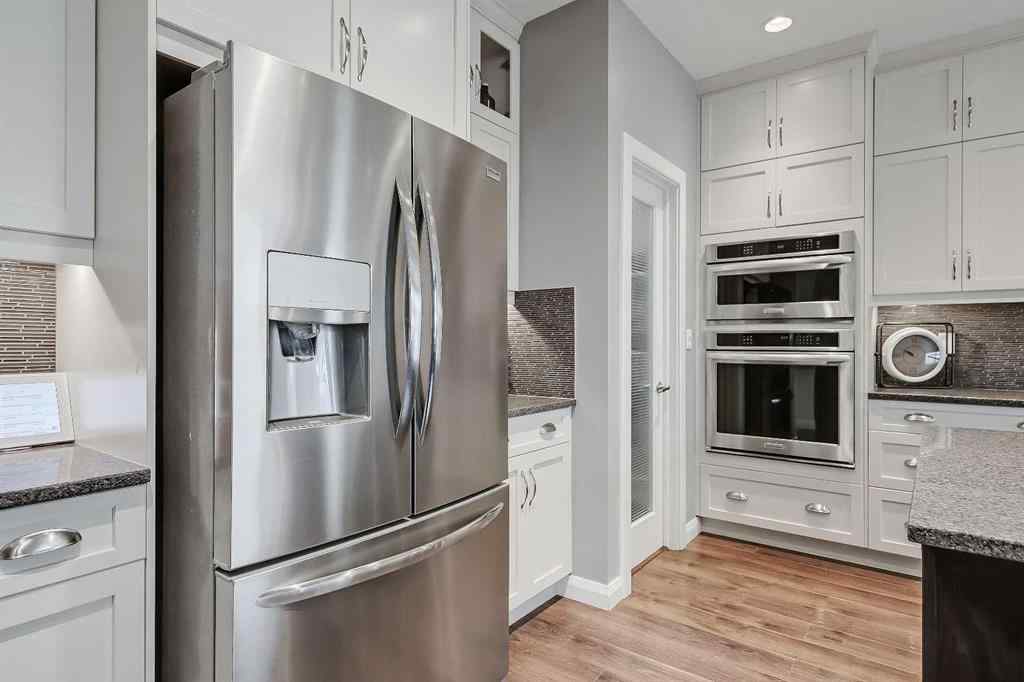 MLS&reg; # A2269307 - 63 Ravenscroft Close SE in Ravenswood Airdrie, Residential Open Houses