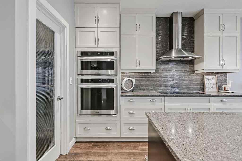 MLS&reg; # A2269307 - 63 Ravenscroft Close SE in Ravenswood Airdrie, Residential Open Houses