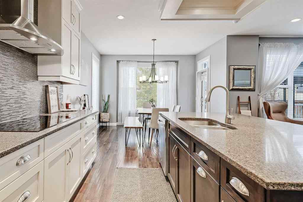 MLS&reg; # A2269307 - 63 Ravenscroft Close SE in Ravenswood Airdrie, Residential Open Houses