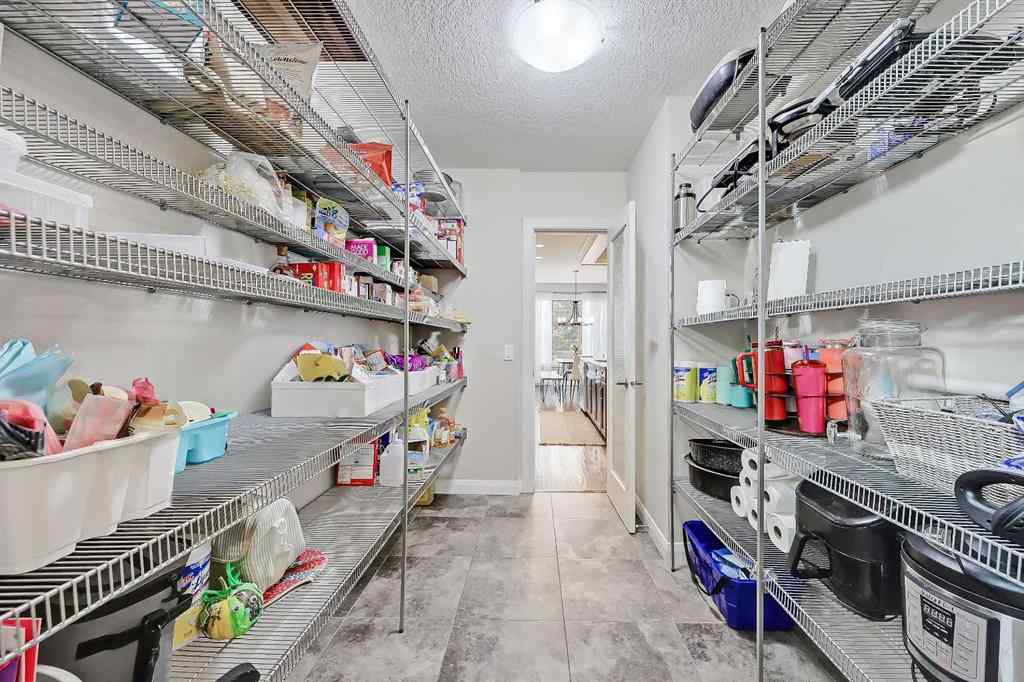 MLS&reg; # A2269307 - 63 Ravenscroft Close SE in Ravenswood Airdrie, Residential Open Houses