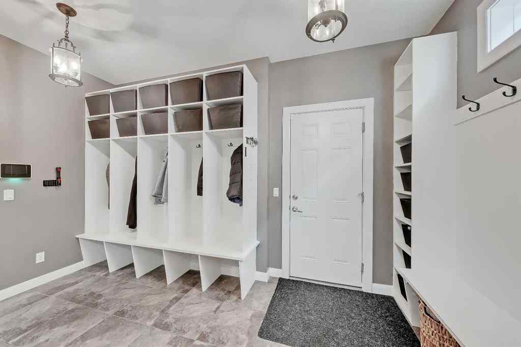 MLS&reg; # A2269307 - 63 Ravenscroft Close SE in Ravenswood Airdrie, Residential Open Houses