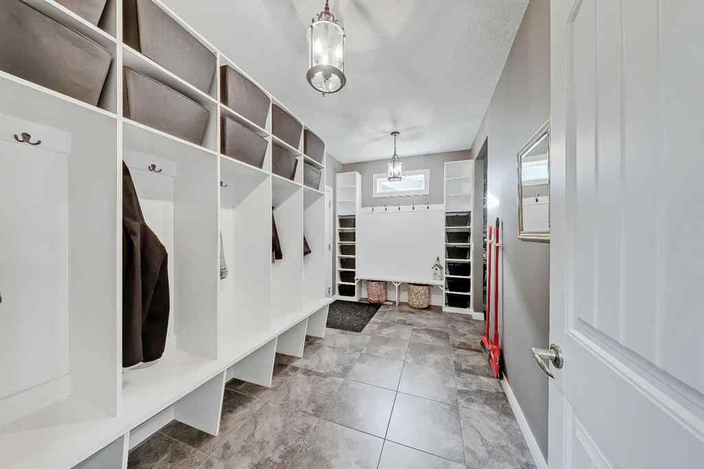 MLS&reg; # A2269307 - 63 Ravenscroft Close SE in Ravenswood Airdrie, Residential Open Houses