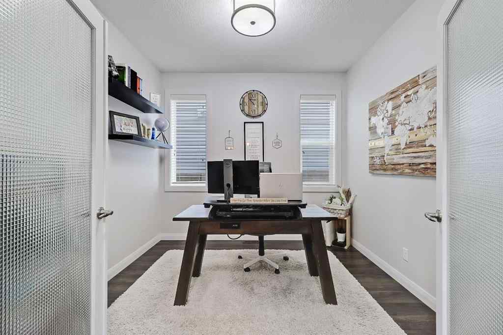 MLS&reg; # A2269307 - 63 Ravenscroft Close SE in Ravenswood Airdrie, Residential Open Houses