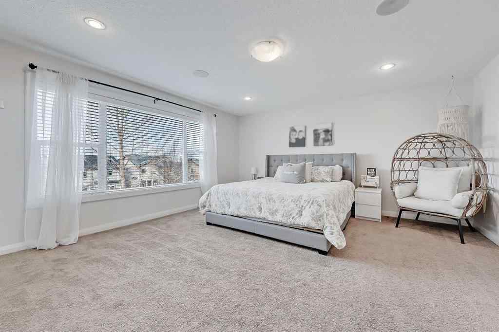 MLS&reg; # A2269307 - 63 Ravenscroft Close SE in Ravenswood Airdrie, Residential Open Houses