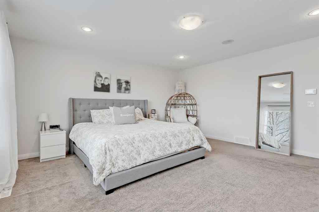 MLS&reg; # A2269307 - 63 Ravenscroft Close SE in Ravenswood Airdrie, Residential Open Houses