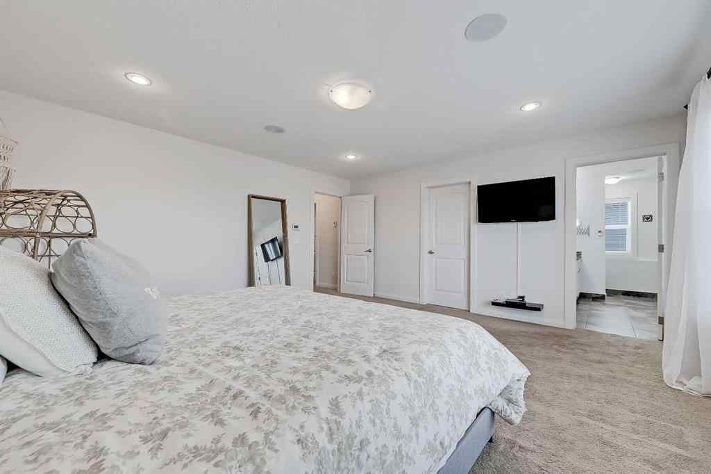 MLS&reg; # A2269307 - 63 Ravenscroft Close SE in Ravenswood Airdrie, Residential Open Houses