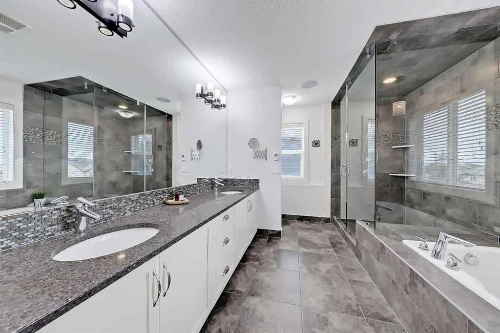 MLS&reg; # A2269307 - 63 Ravenscroft Close SE in Ravenswood Airdrie, Residential Open Houses