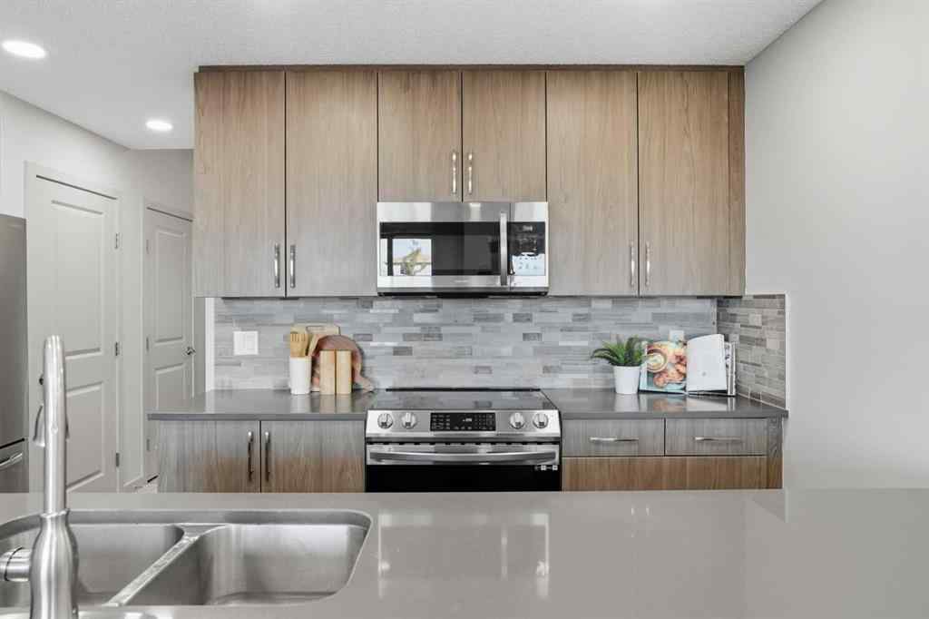 MLS® A2269309 - 91 Evanscrest Way NW in Evanston Calgary, Residential