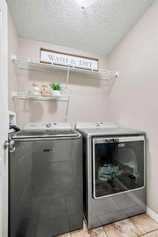 MLS® A2269315 - 209 New Brighton Lane SE in New Brighton Calgary, Residential