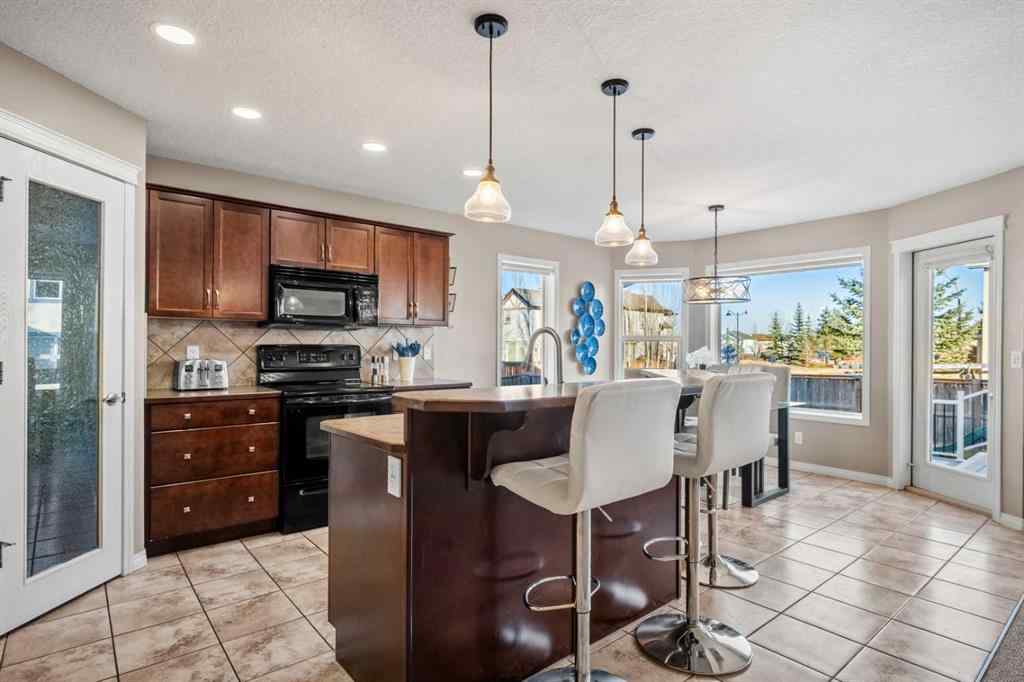 MLS® A2269315 - 209 New Brighton Lane SE in New Brighton Calgary, Residential