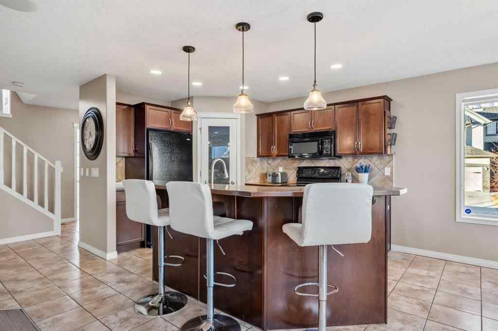 MLS® A2269315 - 209 New Brighton Lane SE in New Brighton Calgary, Residential