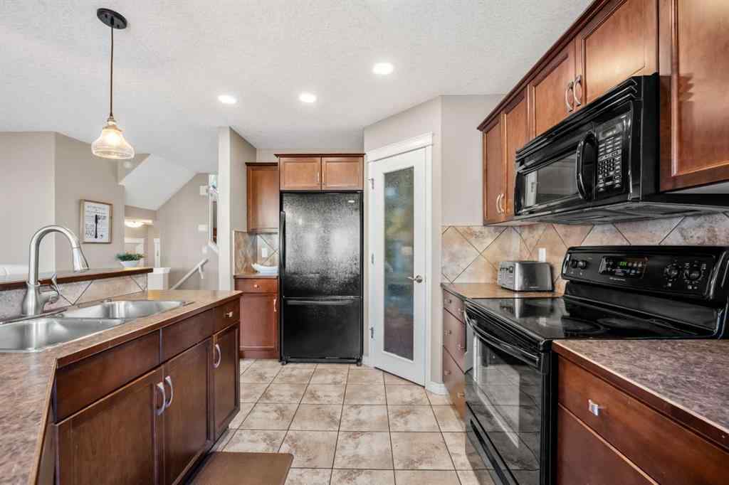 MLS® A2269315 - 209 New Brighton Lane SE in New Brighton Calgary, Residential