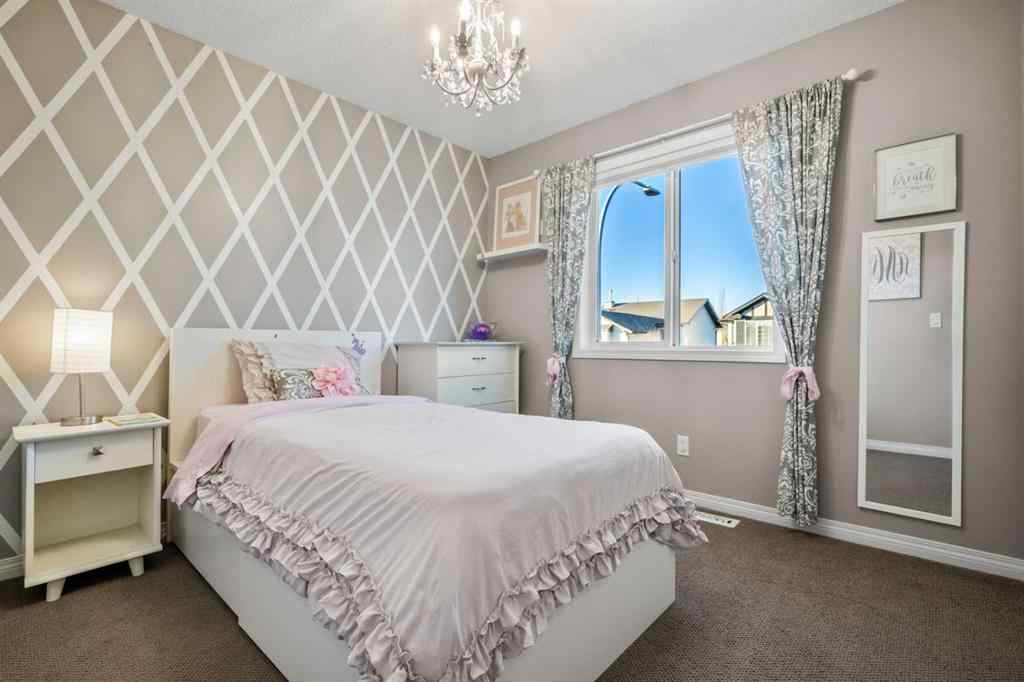 MLS® A2269315 - 209 New Brighton Lane SE in New Brighton Calgary, Residential