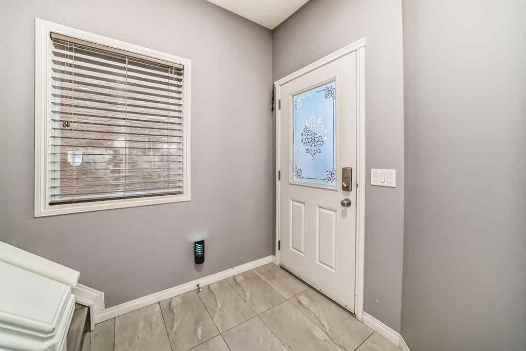 MLS® A2269316 - 216 Saddlecrest Way NE in Saddle Ridge Calgary, Residential