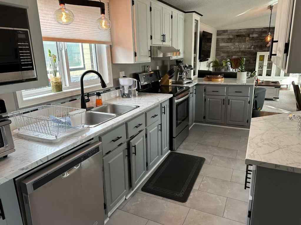 MLS&reg; # A2269337 - 51 McKay Way  in NONE Carstairs, Mobile Open Houses