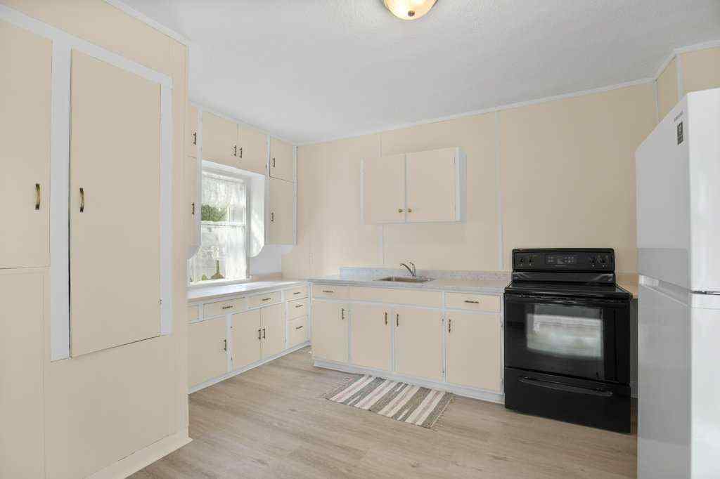 MLS&reg; # A2269341 - 5812 52 Avenue  in Riverside Meadows Red Deer, Residential Open Houses