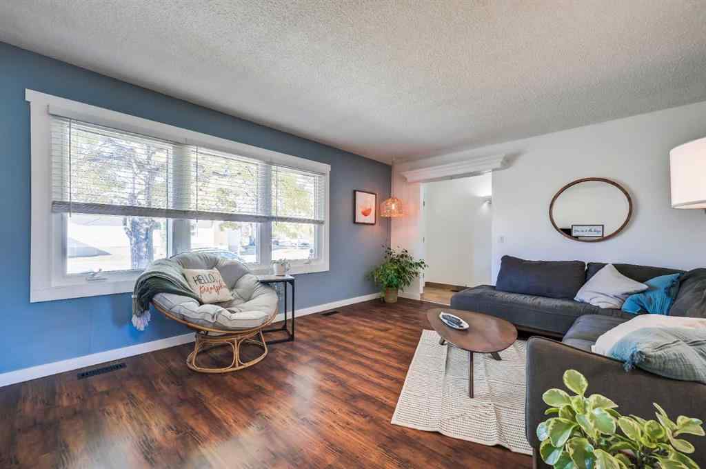 MLS® A2269350 - 828 Queensland Drive SE in Queensland Calgary, Residential
