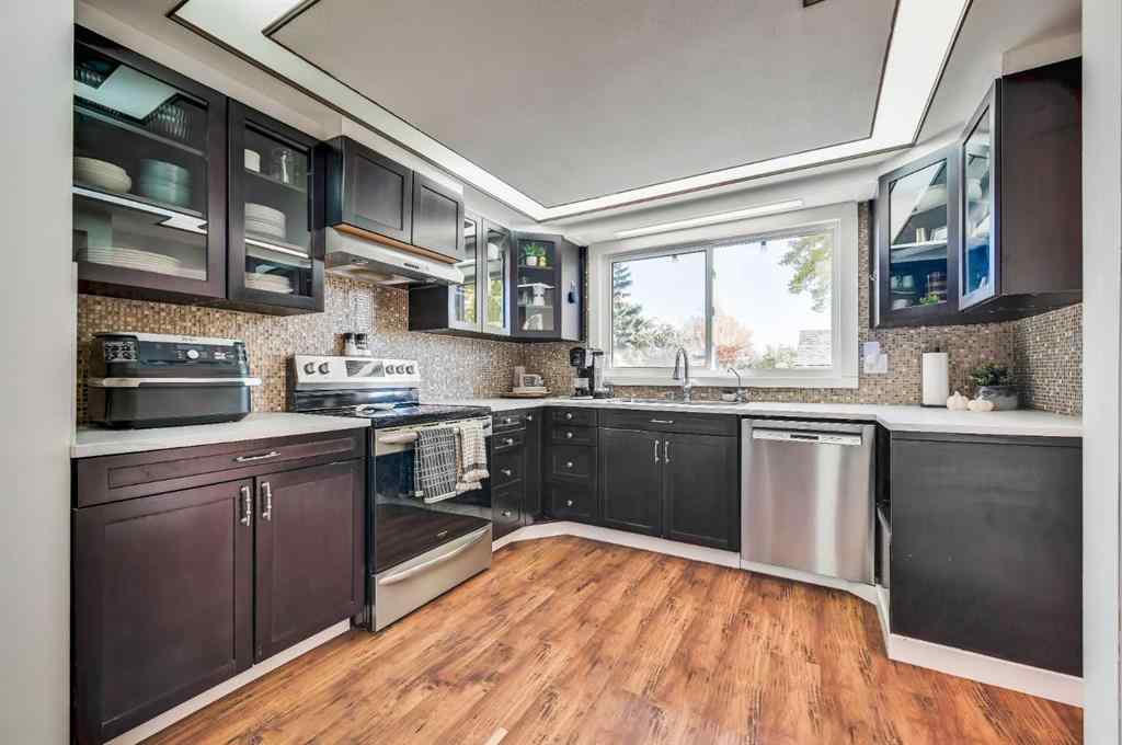 MLS® A2269350 - 828 Queensland Drive SE in Queensland Calgary, Residential