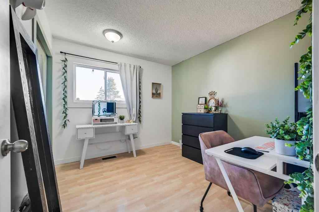 MLS® A2269350 - 828 Queensland Drive SE in Queensland Calgary, Residential