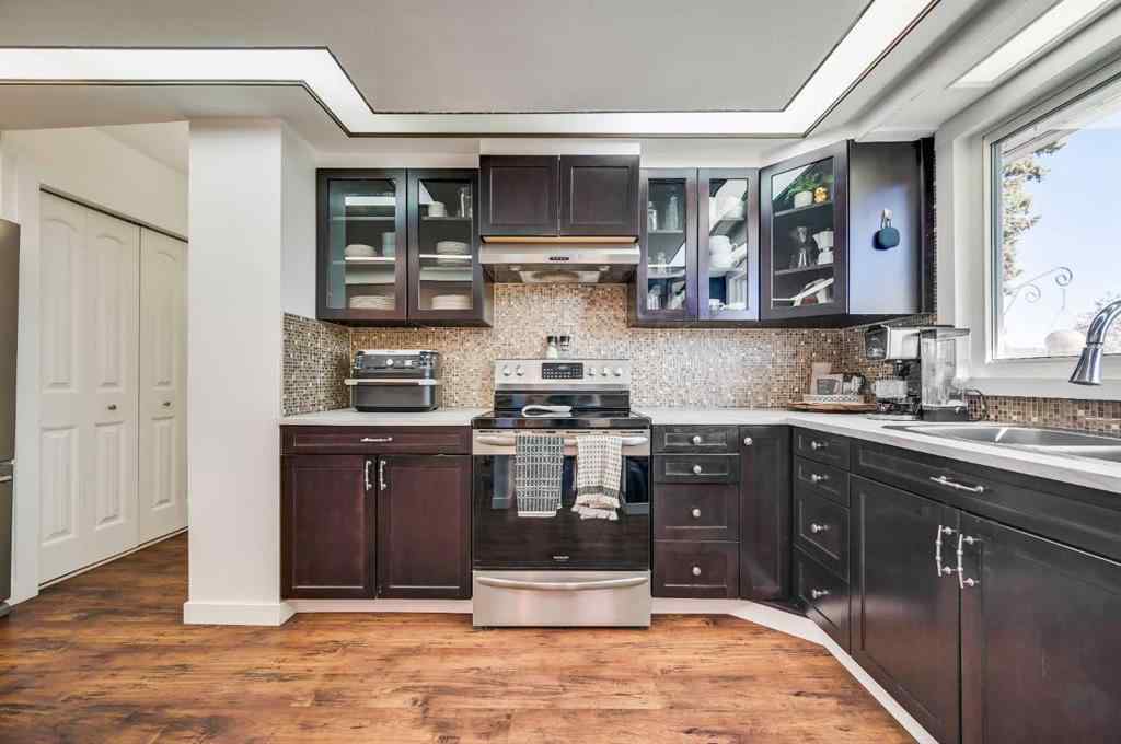 MLS® A2269350 - 828 Queensland Drive SE in Queensland Calgary, Residential