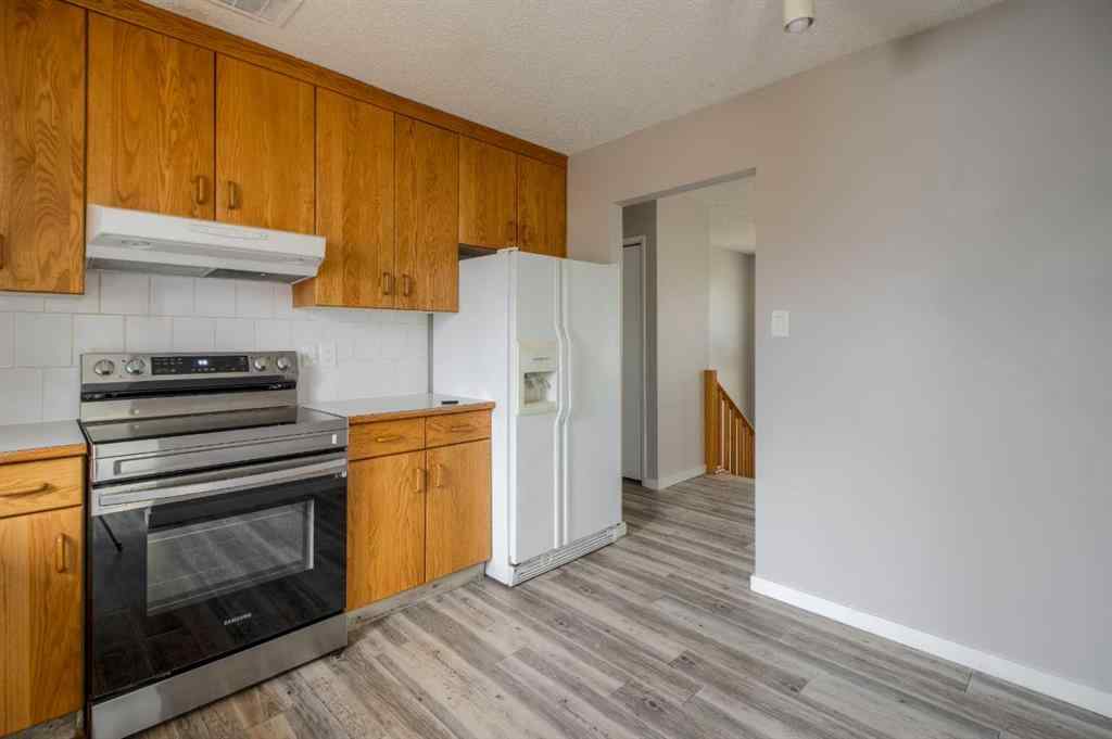 MLS® A2269360 - 49 Simon Fraser Boulevard W in Varsity Village Lethbridge, Residential