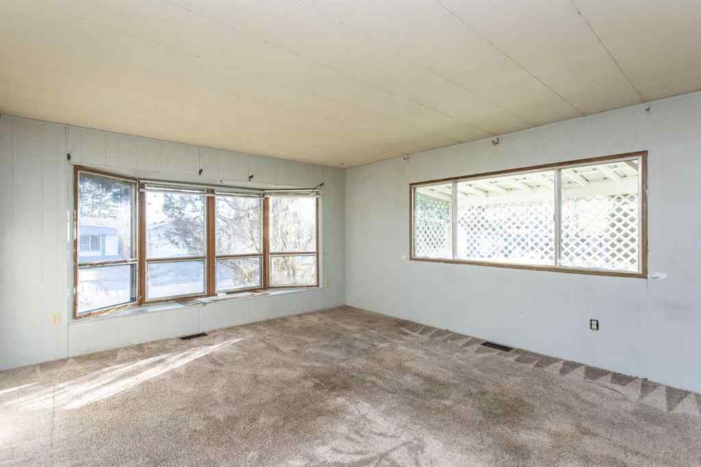 MLS® A2269385 - 7 Parkland Acres  in Parkland Trailer Park Lacombe, Mobile