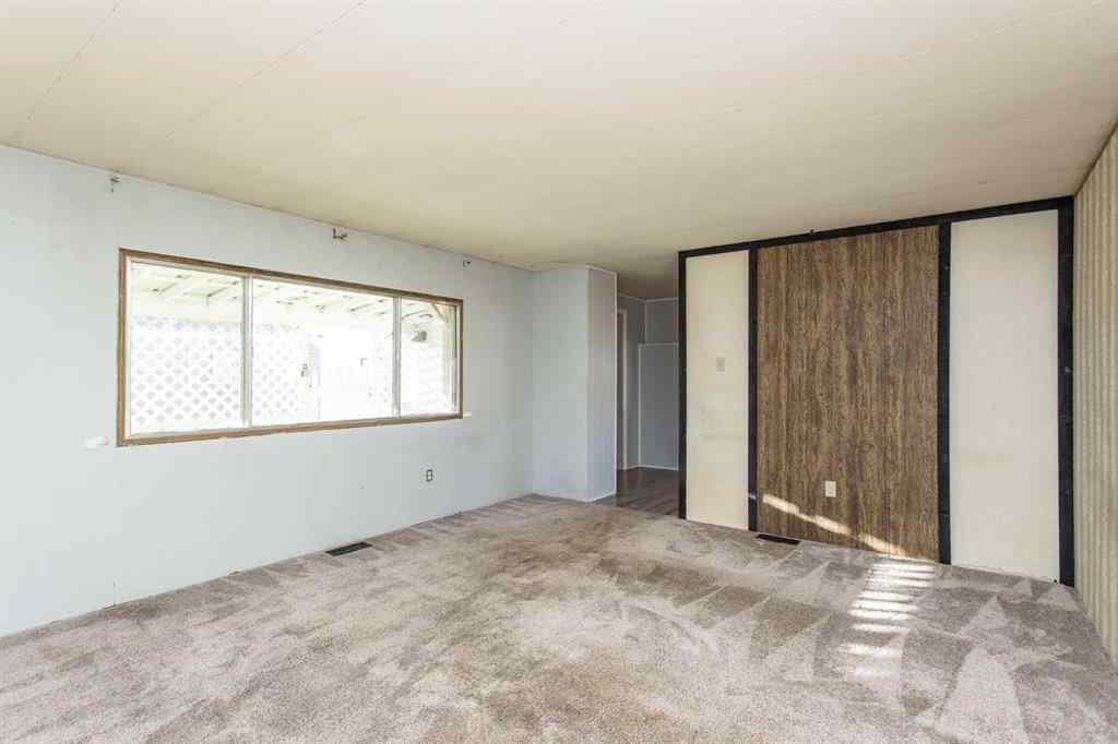 MLS® A2269385 - 7 Parkland Acres  in Parkland Trailer Park Lacombe, Mobile