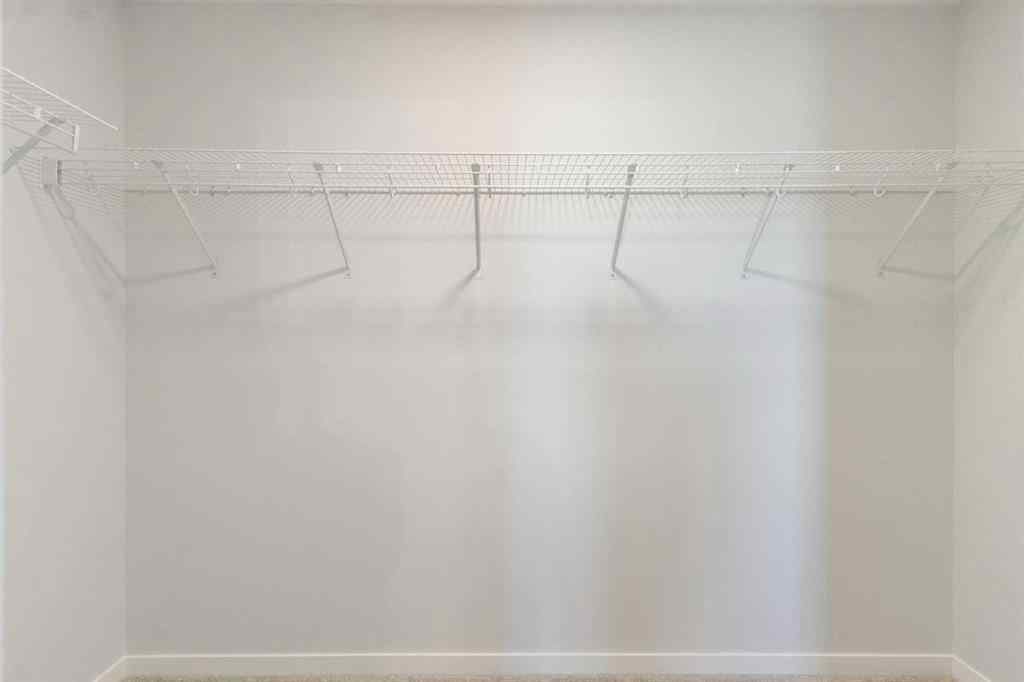 MLS&reg; # A2269397 - 112 Belmont Place SW in Belmont Calgary, Residential Open Houses