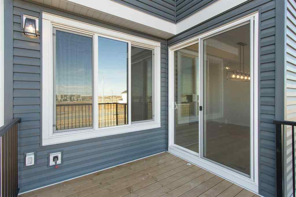 MLS&reg; # A2269397 - 112 Belmont Place SW in Belmont Calgary, Residential Open Houses