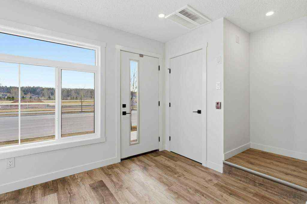 MLS&reg; # A2269399 - Unit #102 156 Park Street  in Greystone Cochrane, Residential Open Houses