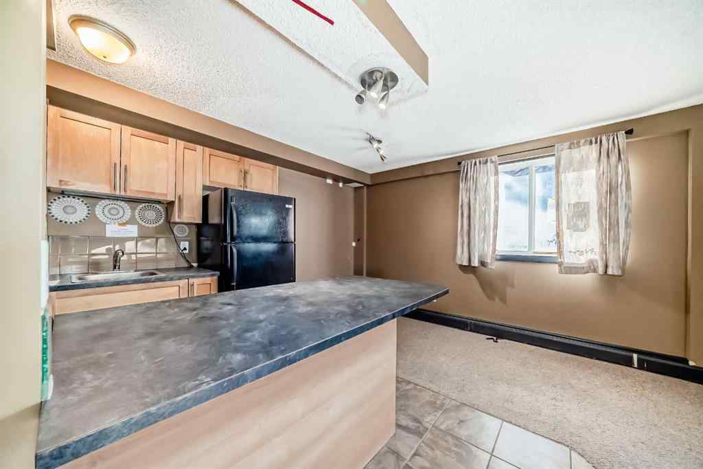 MLS&reg; # A2269403 - Unit #104 620 15 Avenue SW in Beltline Calgary, Residential Open Houses