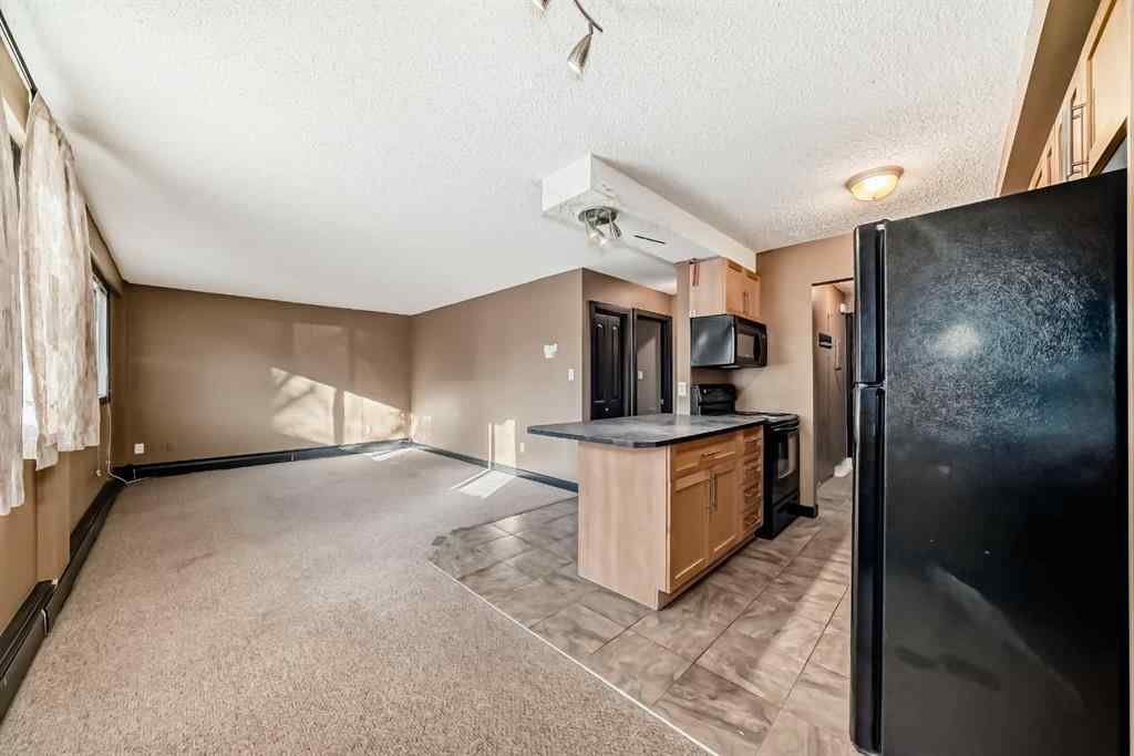 MLS&reg; # A2269403 - Unit #104 620 15 Avenue SW in Beltline Calgary, Residential Open Houses