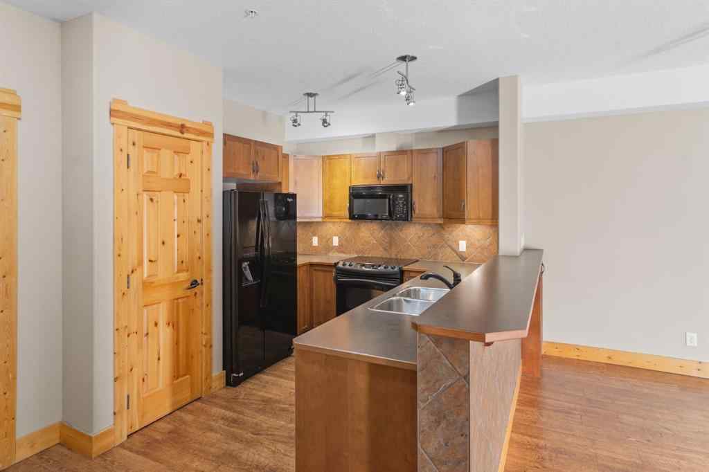 MLS® A2269404 - Unit #204 175 Crossbow Place  in Three Sisters Canmore, Residential