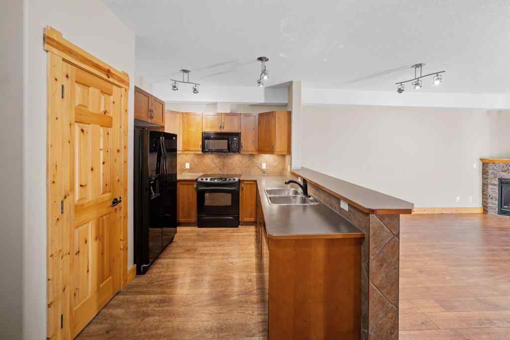 MLS® A2269404 - Unit #204 175 Crossbow Place  in Three Sisters Canmore, Residential