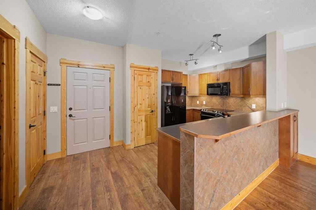MLS® A2269404 - Unit #204 175 Crossbow Place  in Three Sisters Canmore, Residential